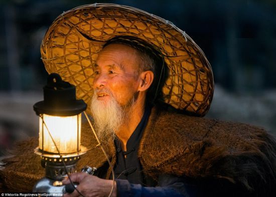 俄罗斯摄影师镜头下的中国鸬鹚捕鱼者