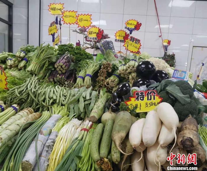 北京西城区某菜市场蔬菜区。中新网记者 谢艺观 摄