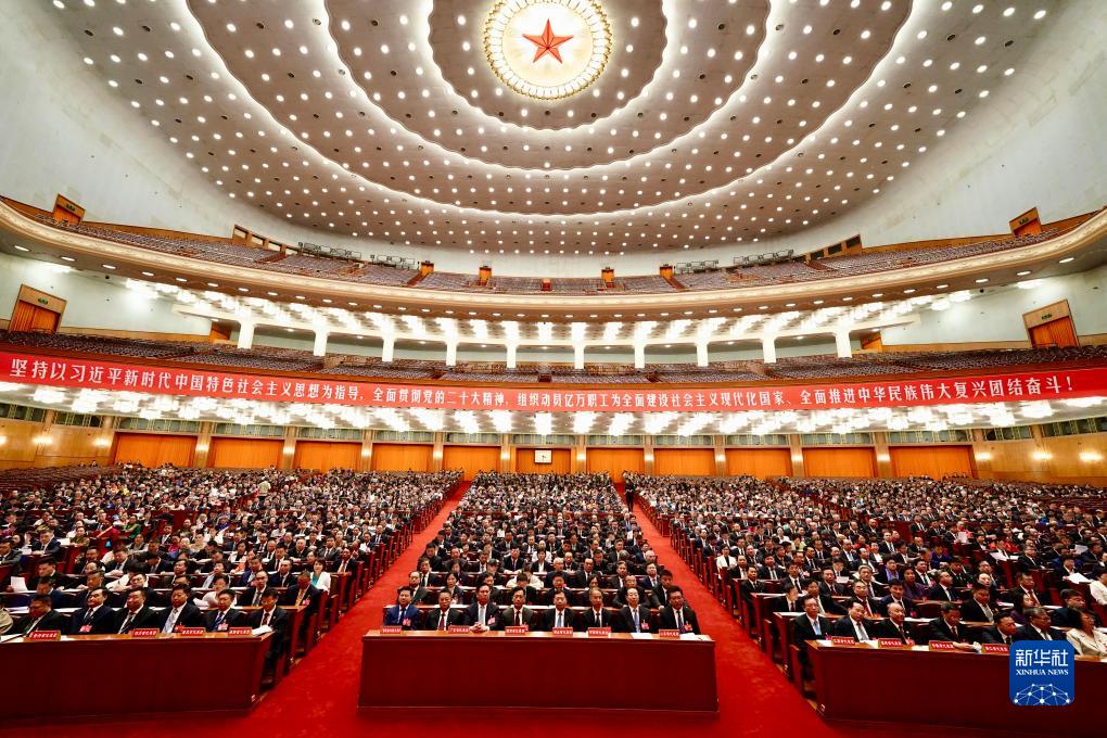 10月12日下午，中国工会第十八次全国代表大会在北京人民大会堂闭幕。新华社发（王鑫 摄）